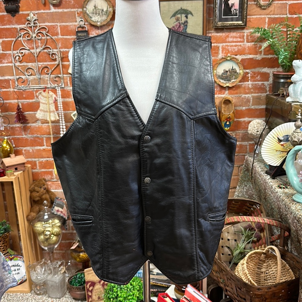 Leather vest with a camel emblem size large